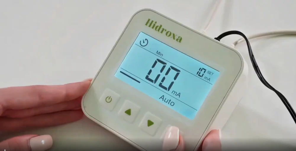 Adjusting Hidroxa iontophoresis machine settings for hyperhidrosis treatment